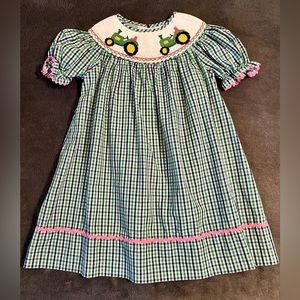 Baby girl smocked gingham dress. Green tractor. Size 18 mo. EUC